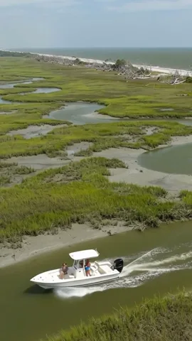 The chosen reframe of the aerial shot, holding the boat